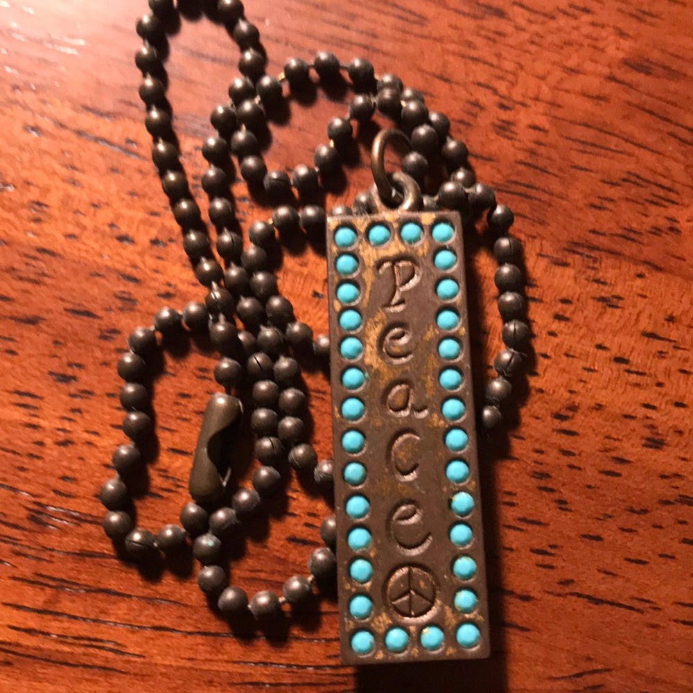 Bronze Sisi Amber peace necklace.